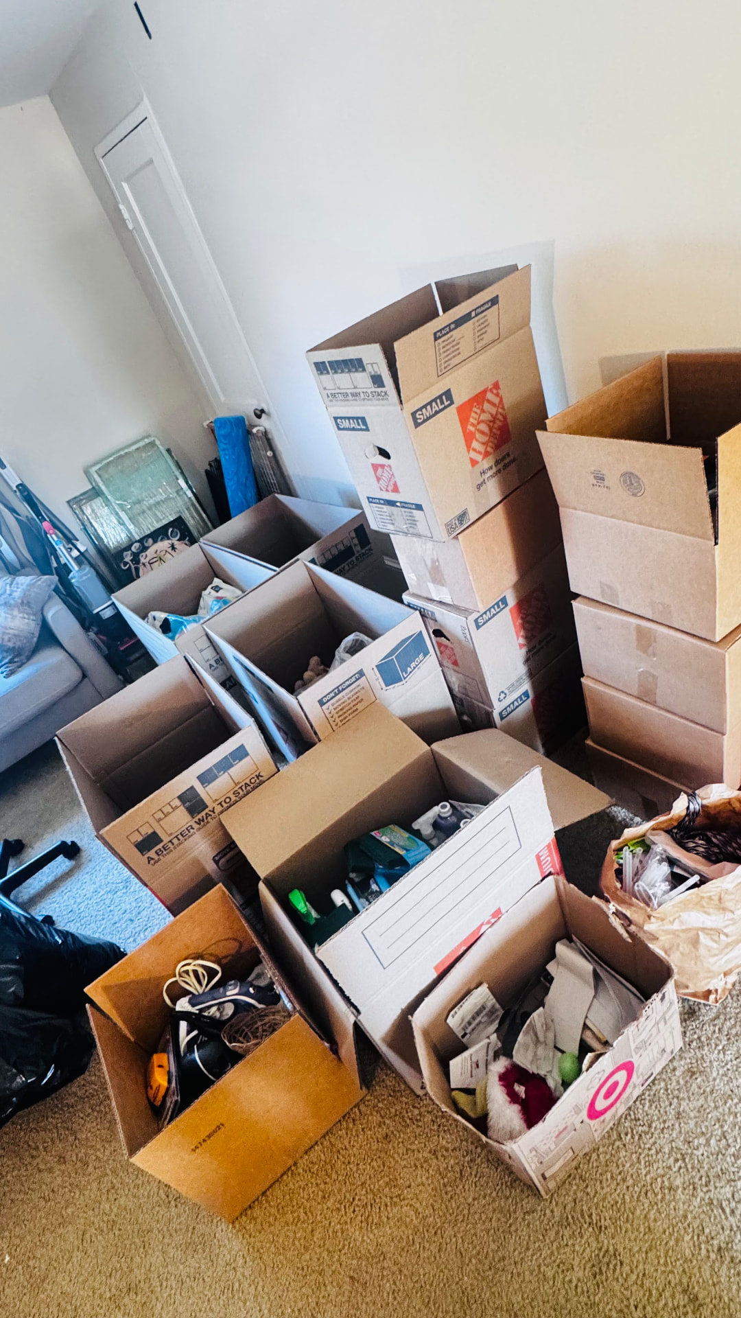 Room mid-pack with sorted and labeled boxes